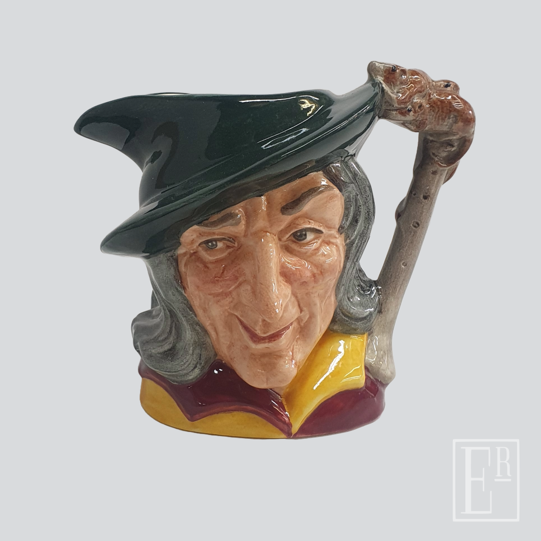 Hand-painted character jug after restoration